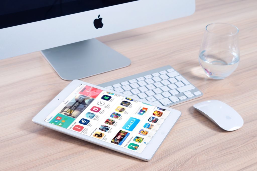 app store on a tablet in front of computer