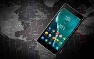 phone screen with app icons and map in background